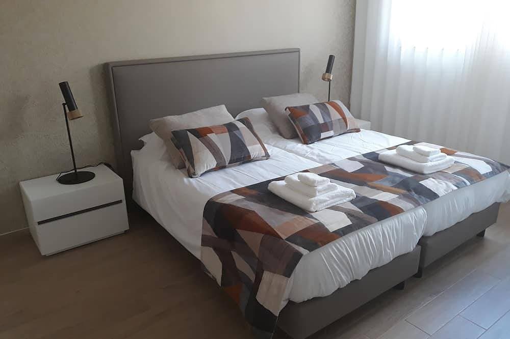 Foto 5 von 30: Genießen Sie modernen Komfort und privaten beheizten Pool im Casa Ambiente Verde