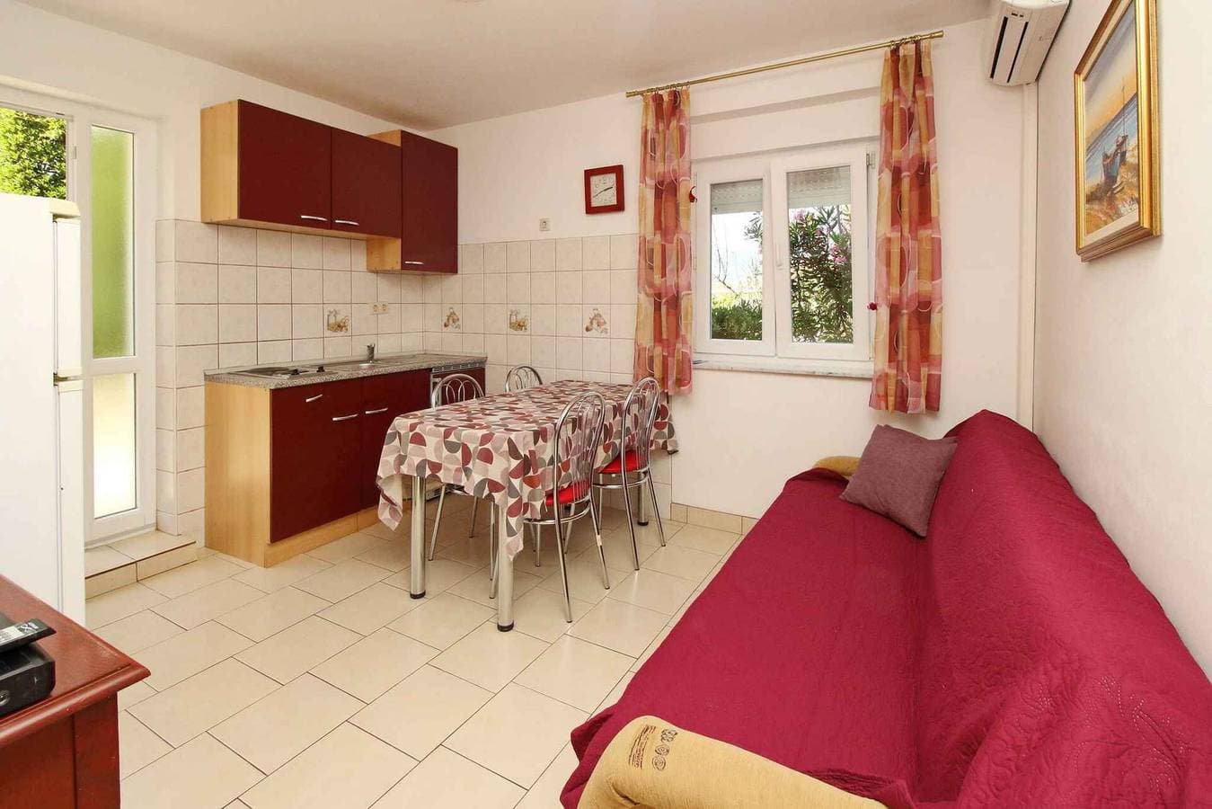 Foto 9 von 22: Ferienwohnung mit Klimaanlage und Terrasse