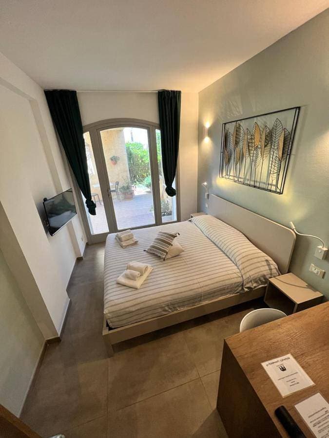 Foto 2 von 9: Double Room with Private Bathroom