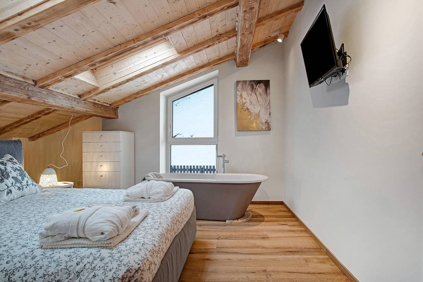 Foto 12 von 36: Ferienwohnung "Wellness Lodge Chicca" mit Seeblick, Sauna & WLAN
