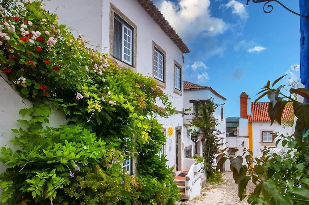 Ein verträumtes Haus in den Mauern der Burg von Óbidos 1