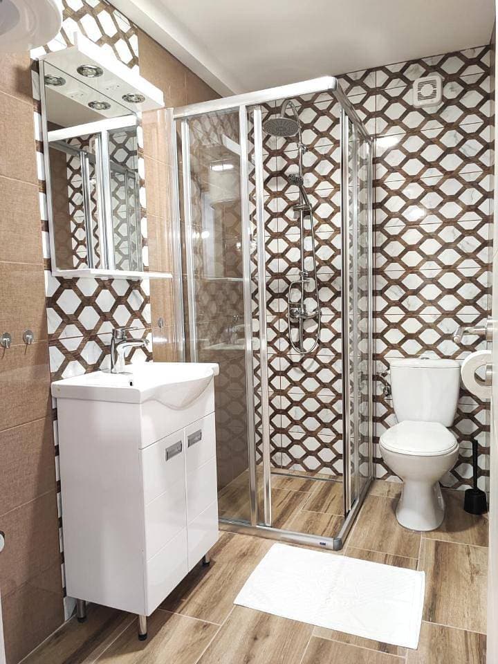 Foto 11 von 11: Triple Room with Bathroom