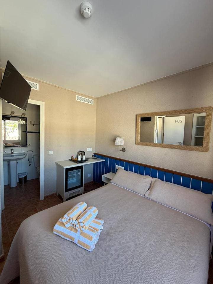 Foto 11 von 17: Double Room with Private Bathroom