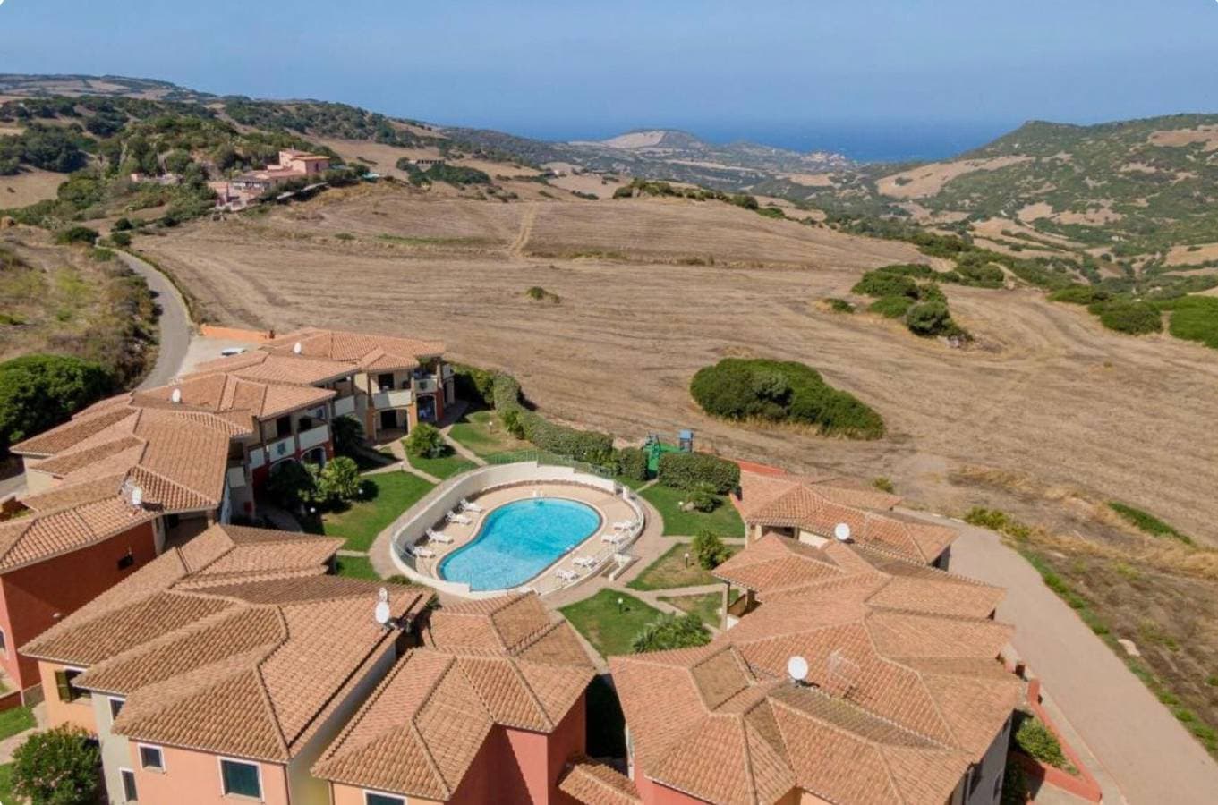 Foto 10 von 37: Residenza Le Farfalle 'A' mit Gartenblick, WLAN und Klimaanlage