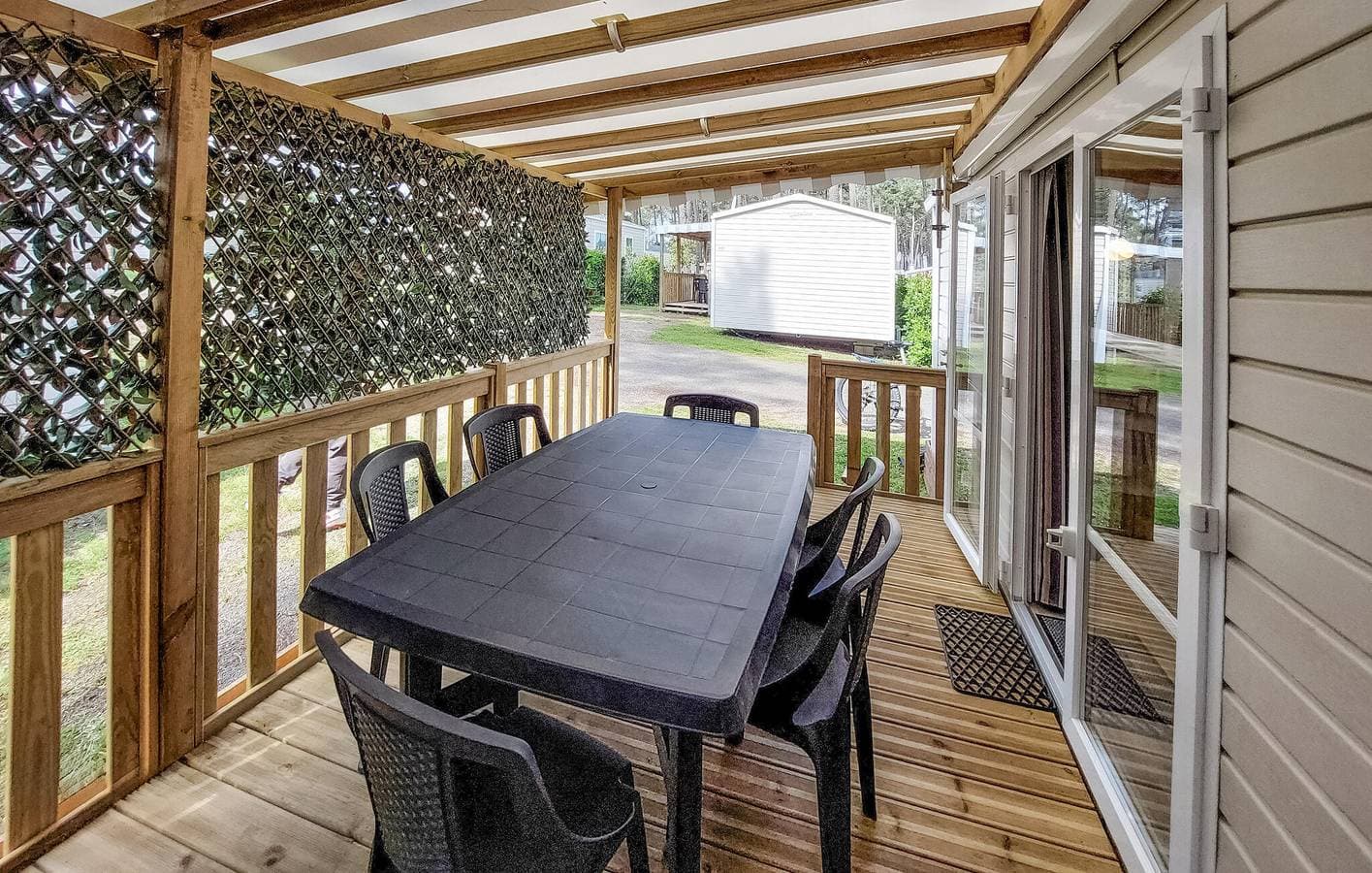 Foto 3 von 30: Gemütliches Mobilheim mit Parkplatz, WiFi, AC, Pool & Garten, Nähe Restaurant