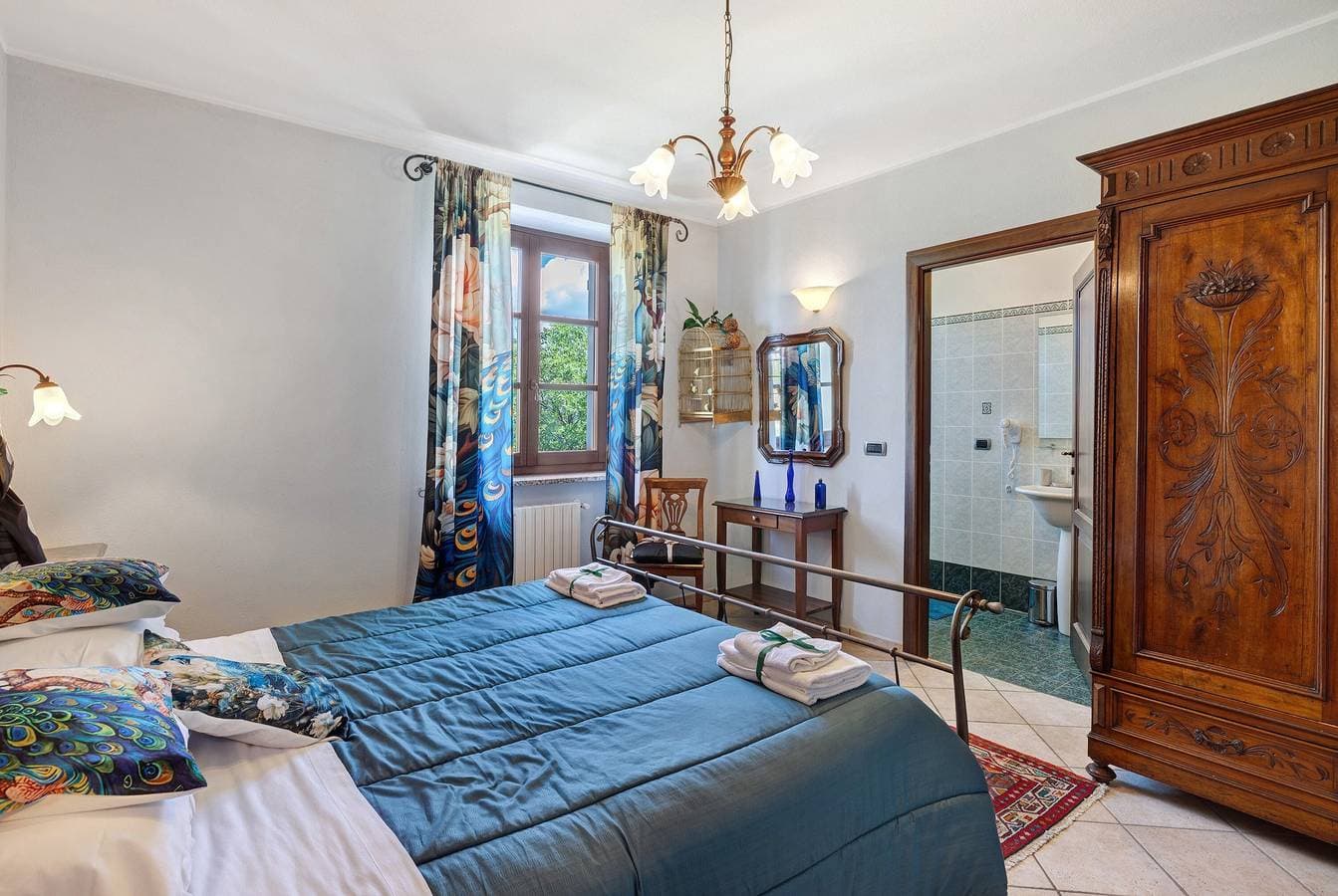 Foto 5 von 46: Zimmer 'Moscato' mit Gemeinschaftsterrasse, Gemeinschaftsgarten und Wi-Fi
