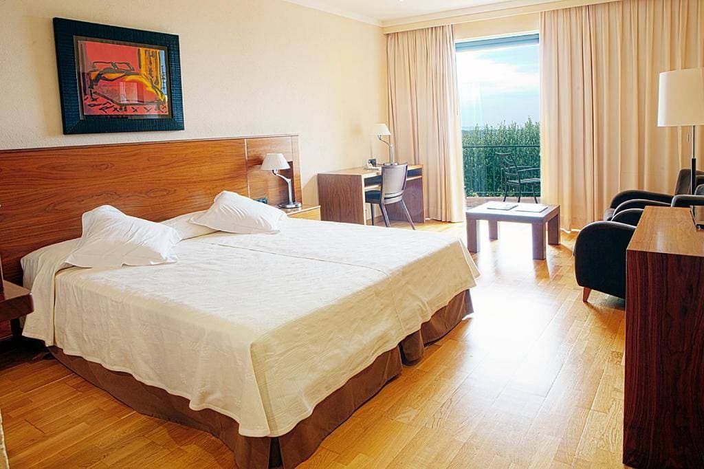Foto 2 von 10: Economy Double Room