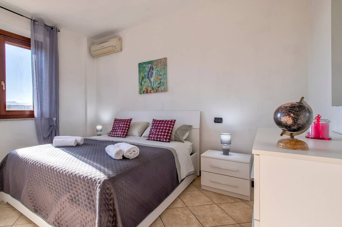 Foto 12 von 23: Ferienwohnung 'Casa Vacanze Emma' mit Bergblick, WLAN und Klimaanlage