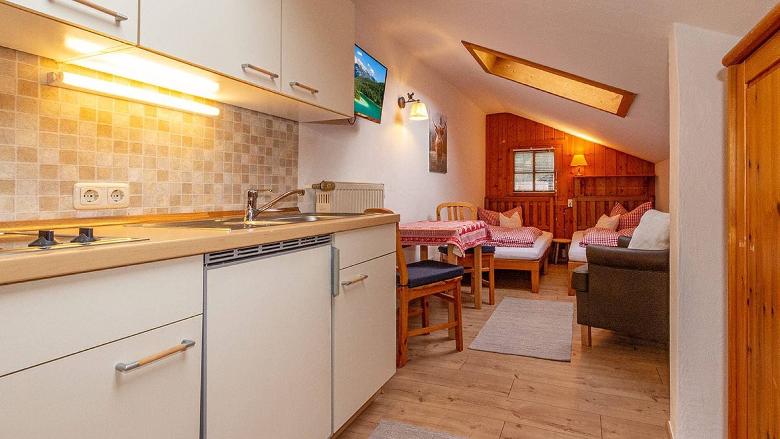 Foto 8 von 14: Einzimmerapartment 'Mini Apartment 3' mit Bergblick, Gemeinschaftsgarten und WLAN