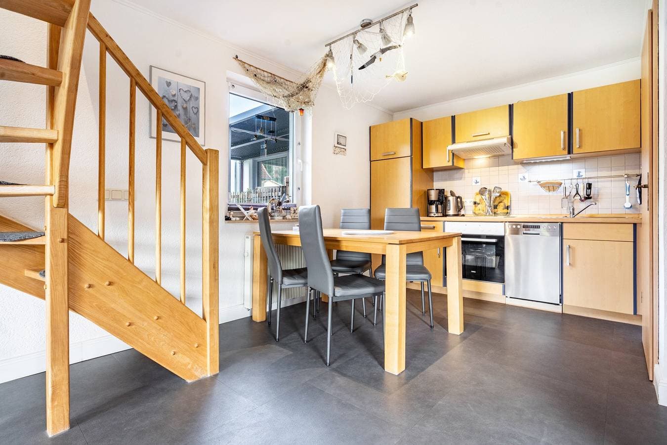 Foto 9 von 31: Ferienhaus 'Lütt-Matten' mit Gemeinschaftsterrasse, privatem Garten und WLAN