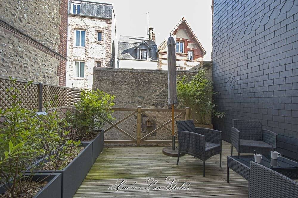 Foto 7 von 7: Cute studio on Gf w/ bed & private terrace hyper quiet & central - Studio Les Galets ★★★★