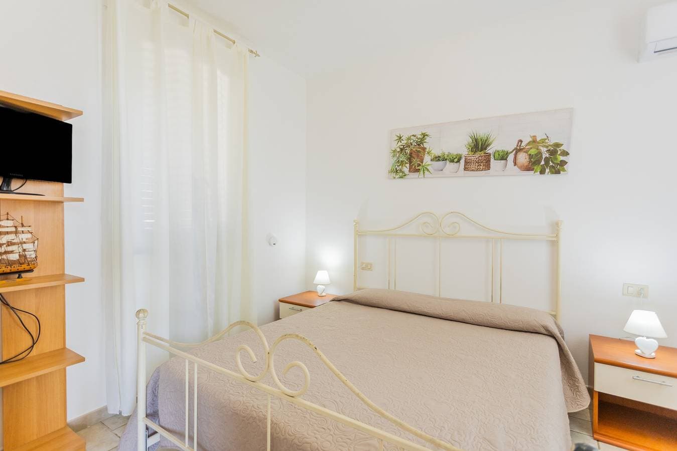 Foto 6 von 24: Ferienhaus 'Am Hafen – nur Schritte vom Meer' mit Meerblick, privater Terrasse & Klimaanlage