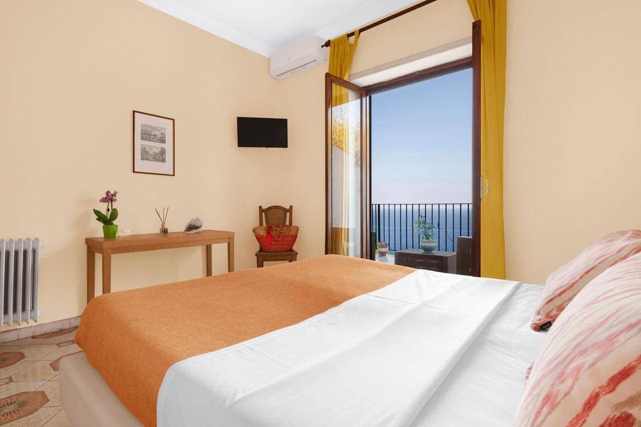 Foto 5 von 7: Triple Room with Balcony