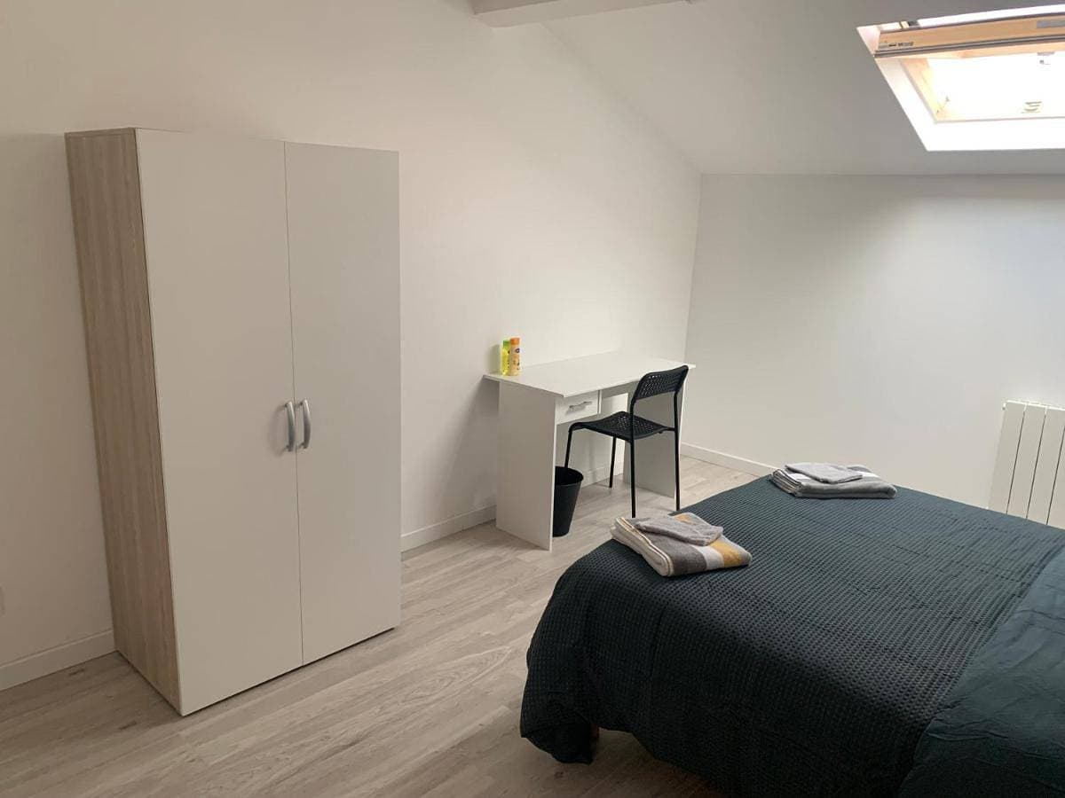 Foto 4 von 8: Double Room with Shared Bathroom