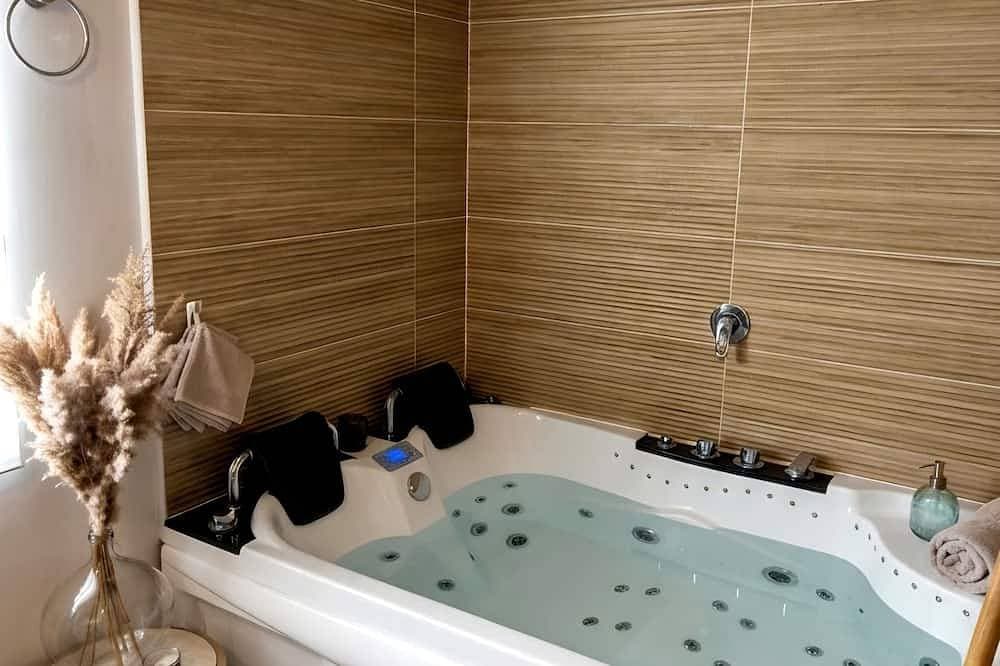 Foto 7 von 17: Suite with a private hot tub