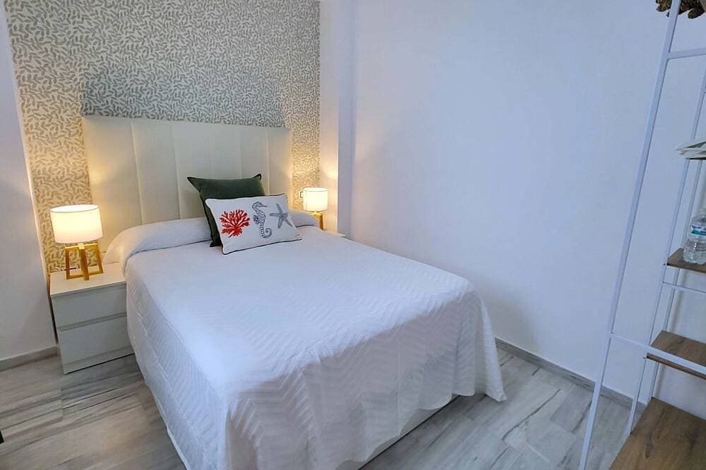 Foto 4 von 30: Sol Suites Apartment with a Balcony