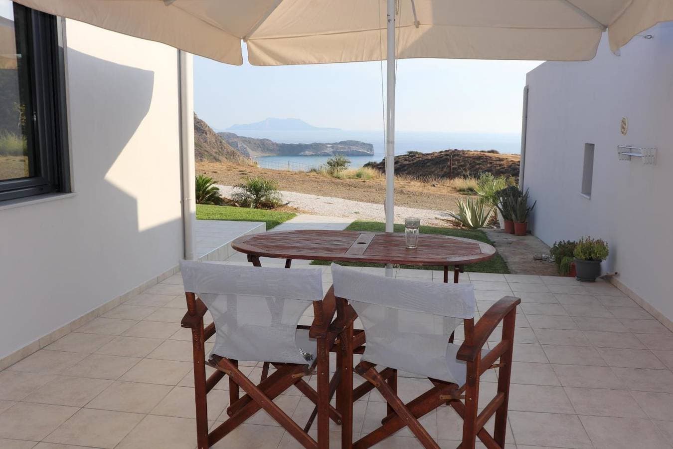 Foto 7 von 38: Weiter Blick auf Landschaft und Meer, Pool, 4 Pers. | Ferienhaus Triopetra, Kreta
