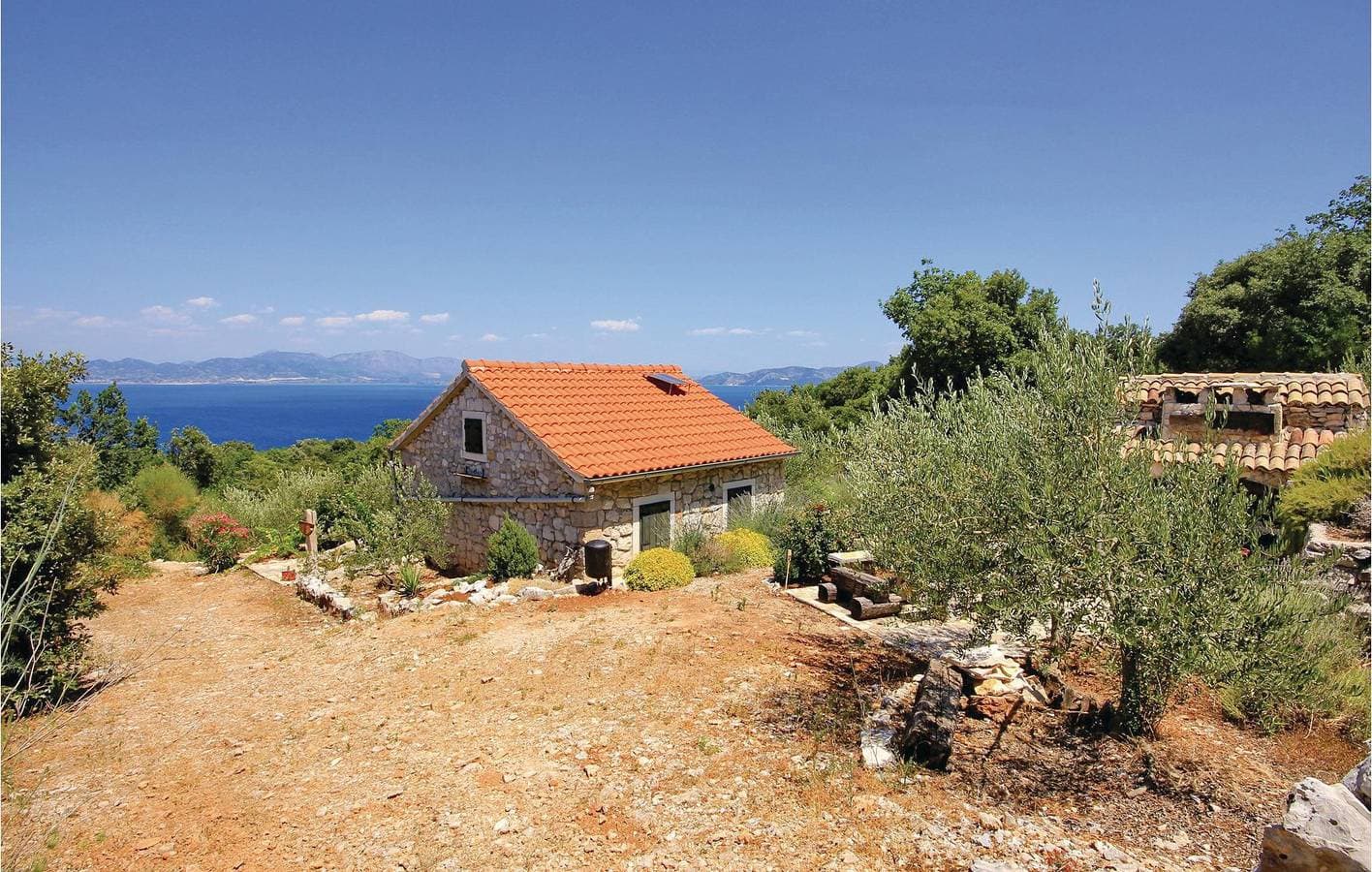 Foto 2 von 43: Gemütliche Ferienwohnung mit Terrasse und Kamin, 2,5 km vom Strand entfernt