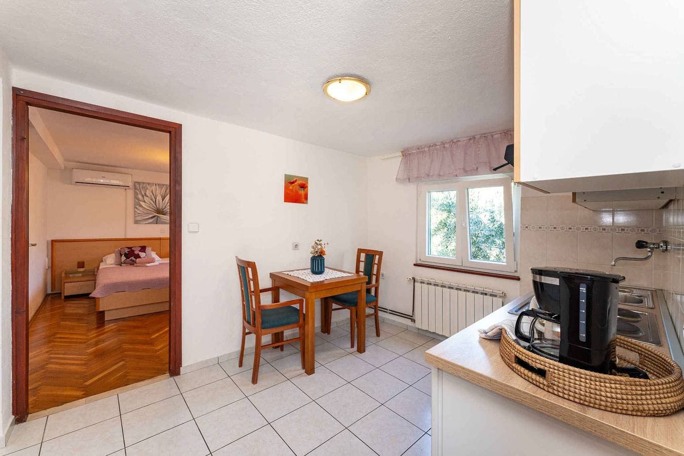 Foto 8 von 35: Ferienwohnung mit Terrasse und Klimaanlage