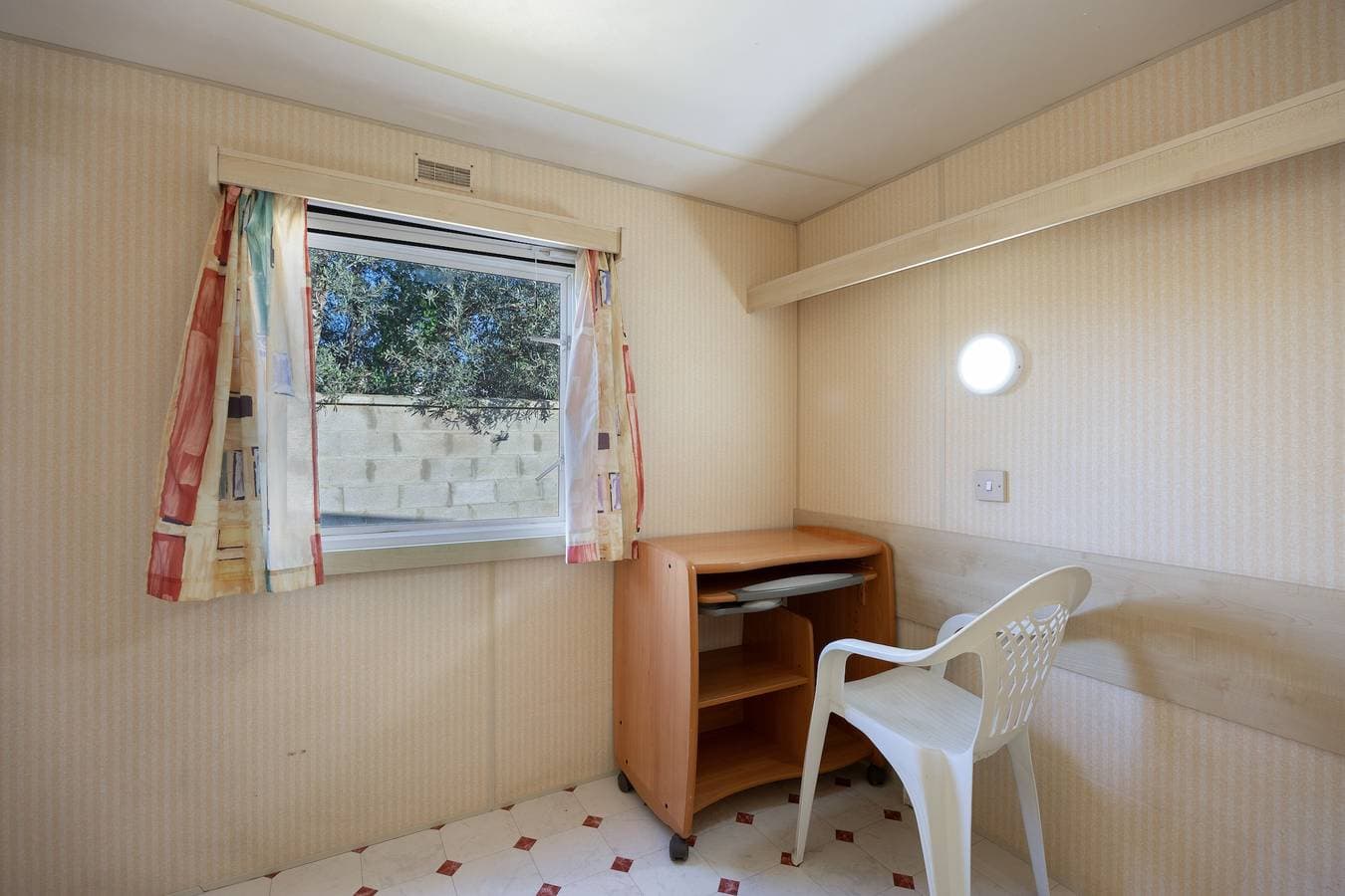 Foto 13 von 23: Mobilheim 'Manoli' mit privatem Garten und Balkon