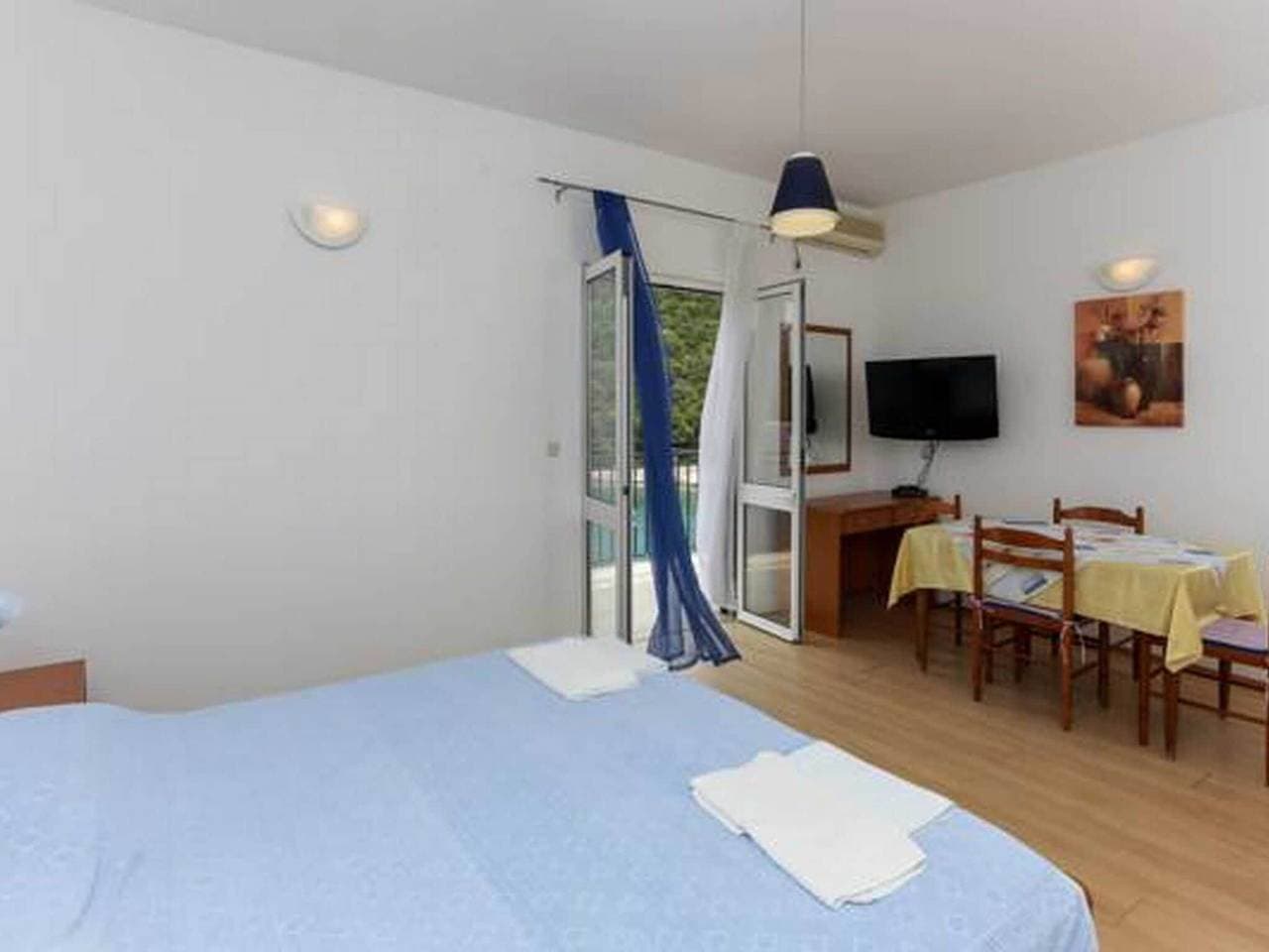 Foto 6 von 10: Apartments Posta - Comfort Studio with Balcony and Sea View - Apartman 1