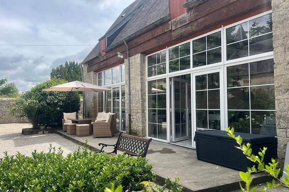 Foto 13 von 14: Cottage 'Gîte 5' mit gemeinsamer Terrasse und Garten