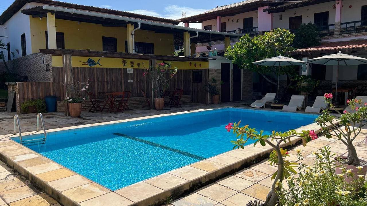 Foto 4 von 7: Pousada Chalet La Pink