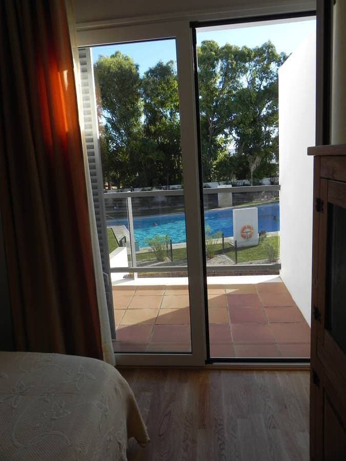 Foto 6 von 7: Strand- und Stadtnah mit Gemeinschatspool, Zentrale Klimaanlage, Smart TV - Casa Marivi -