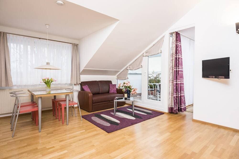 Appartement 2  Dachgeschosswohnung mit Terrasse 1