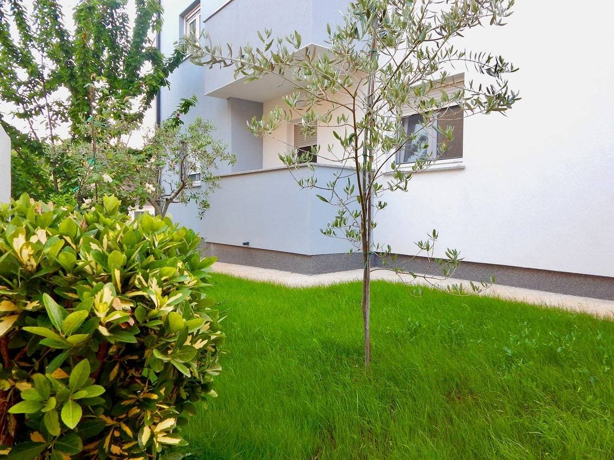 Foto 12 von 14: Comfortable lovely apartment with patio and grill / A2