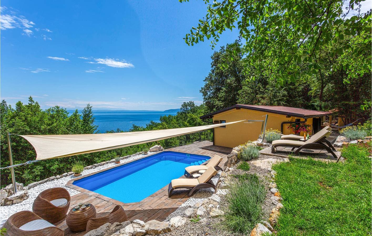 Foto 4 von 36: Apartment am Meer mit beheiztem Pool, Parkplatz und Terrasse