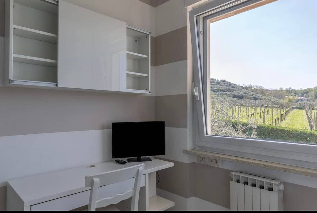 Foto 12 von 16: Ferienwohnung Trilocale Colline di Bardolino mit WLAN, Klimaanlage und Garten