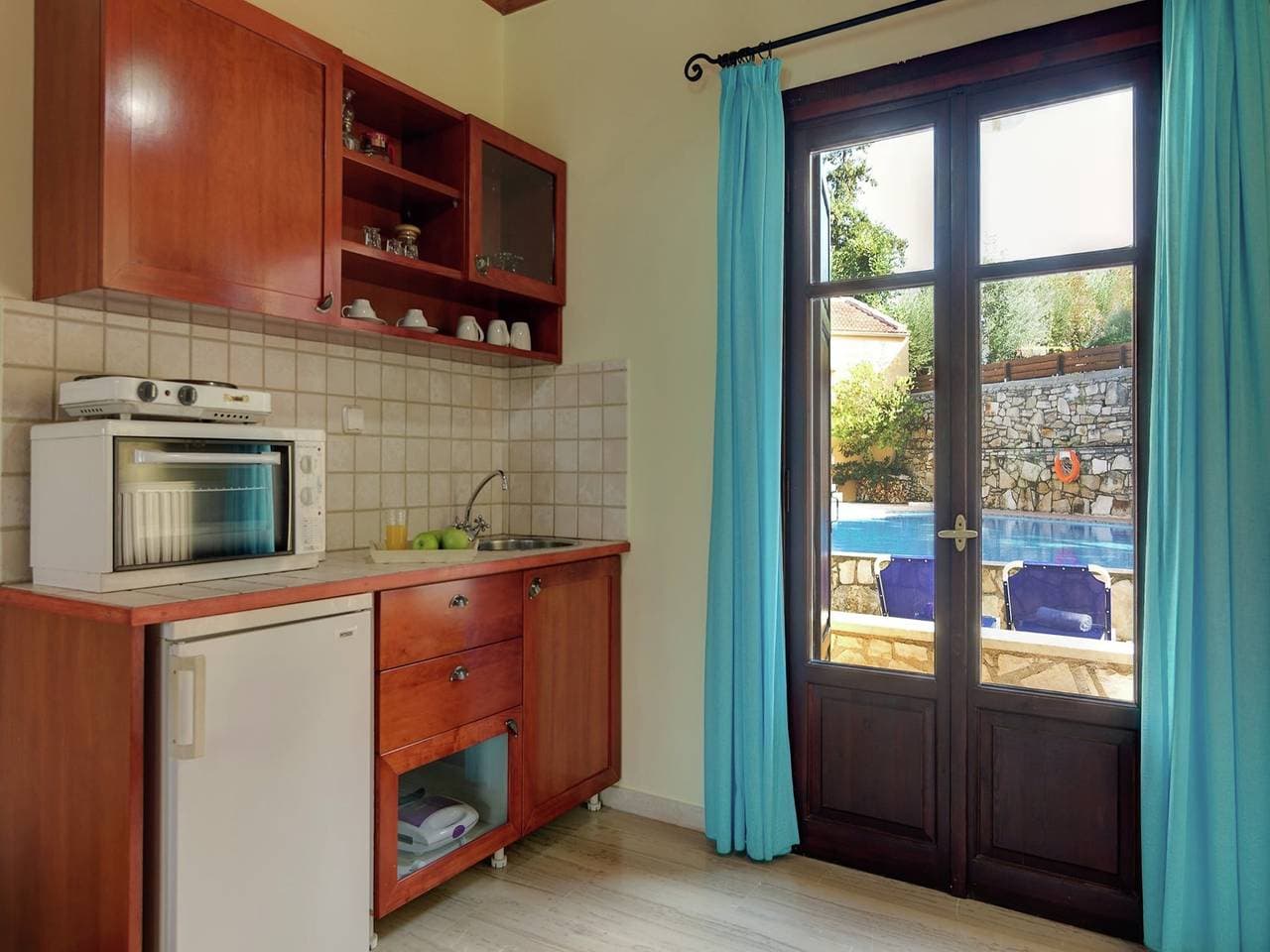 Foto 3 von 25: Ferienhaus in Douliana mit Gemeinschaftspool