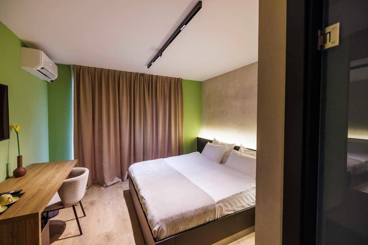 Foto 4 von 11: Double Room with Balcony (2 Adults + 1 Child)