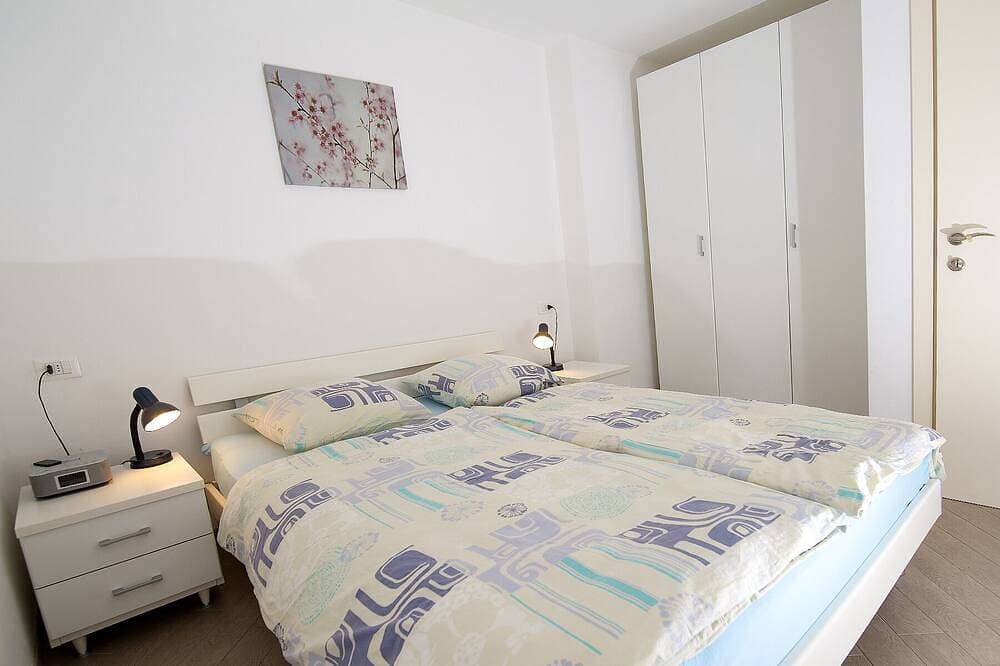 Foto 7 von 23: FeWo Farfalla mit Klima, Pool und Parkplatz mit Ladestation 22 kw, 250 Meter See