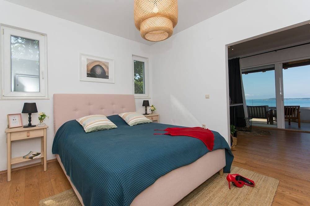 Foto 5 von 30: Dreamhouse Soline Sea View, Pool and Jacuzzi Green Studio Apartment