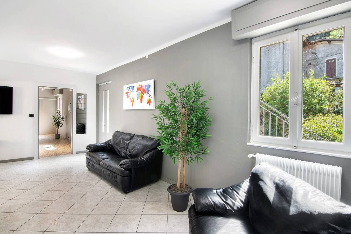 Foto 7 von 24: Ferienwohnung "Dongo Garden" mit privatem Garten & WLAN
