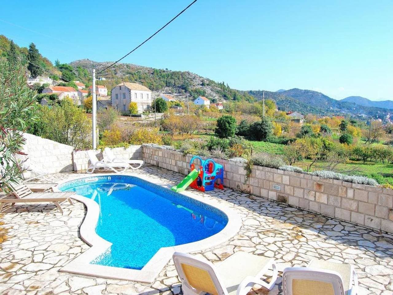 Foto 5 von 33: Villa Tony - Five Bedroom Villa with Terrace, Swimming Pool and Sea View