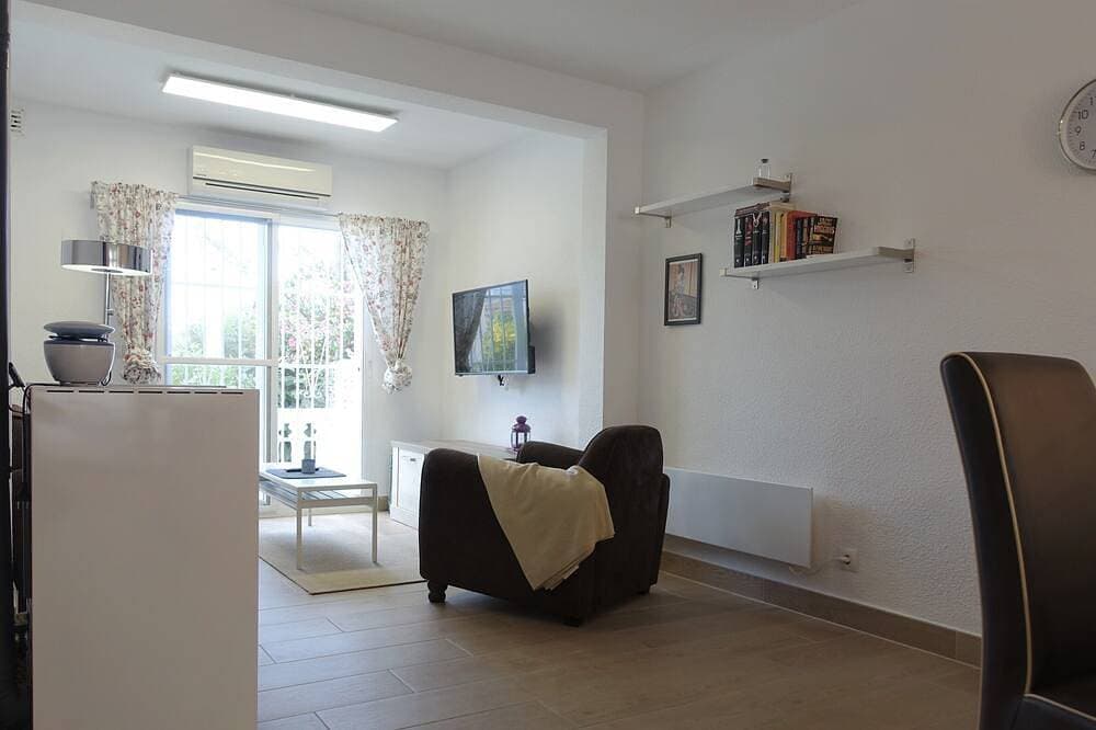Foto 4 von 30: Albir Apartment in Haus mit Gemeinschaftspool, mit dem Garten