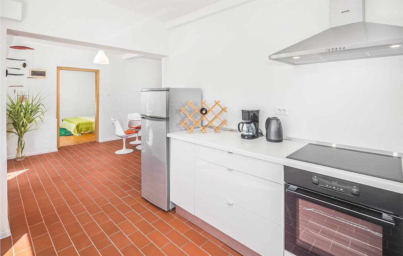 Foto 9 von 37: Charmante 74 m² große Wohnung mit Terrasse, Pool und WLAN für Ihren perfekten Urlaub