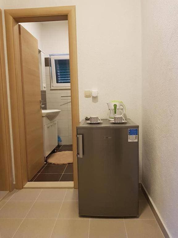 Foto 4 von 11: Double Room with Private Bathroom