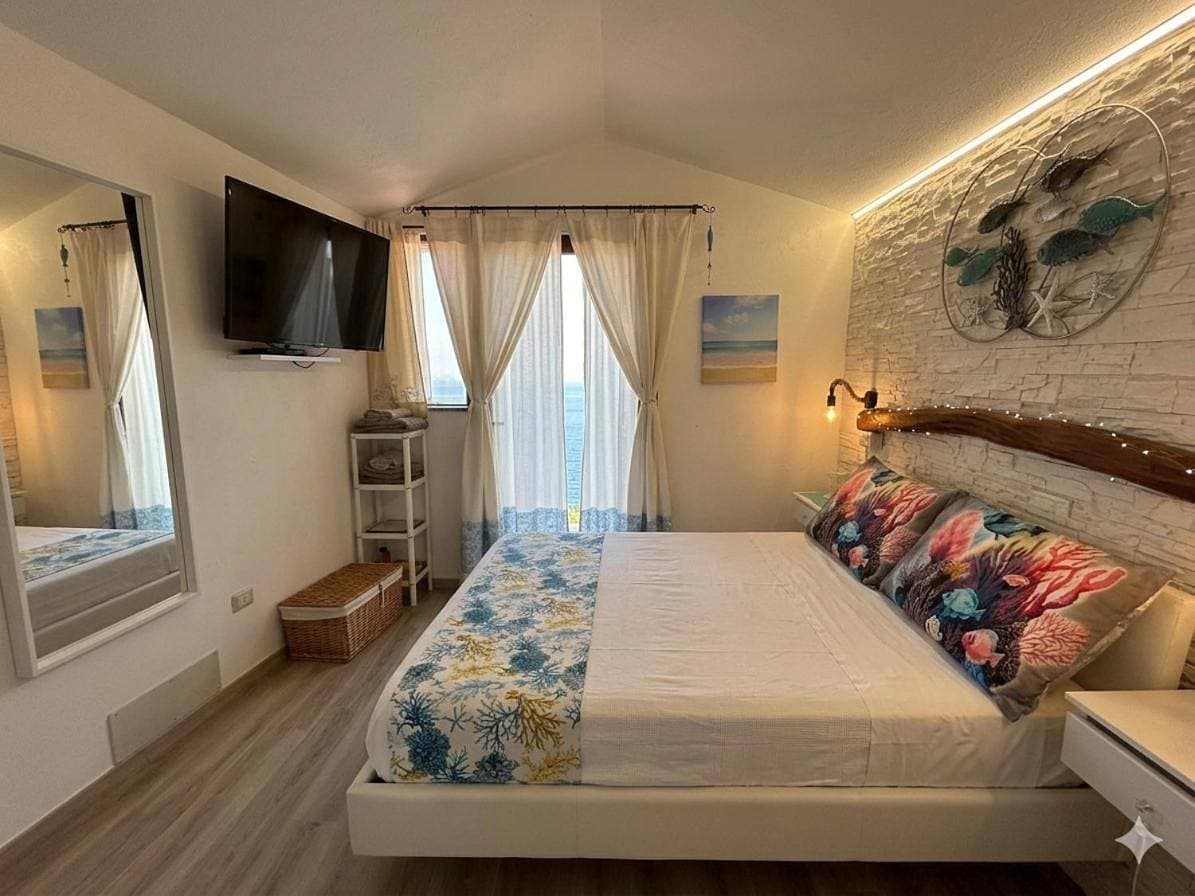 Oasi del Relax - Seaside Peaceful Panoramic Terrace in ITALY - new Sardinia apartment 50 mt beach&sea full comfort air conditioning-WiFi-Parking-Privacy 1