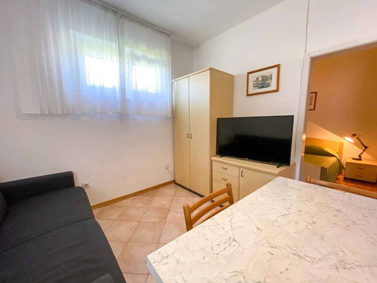 Foto 10 von 27: Ferienwohnung mit Terrasse und Klimaanlage