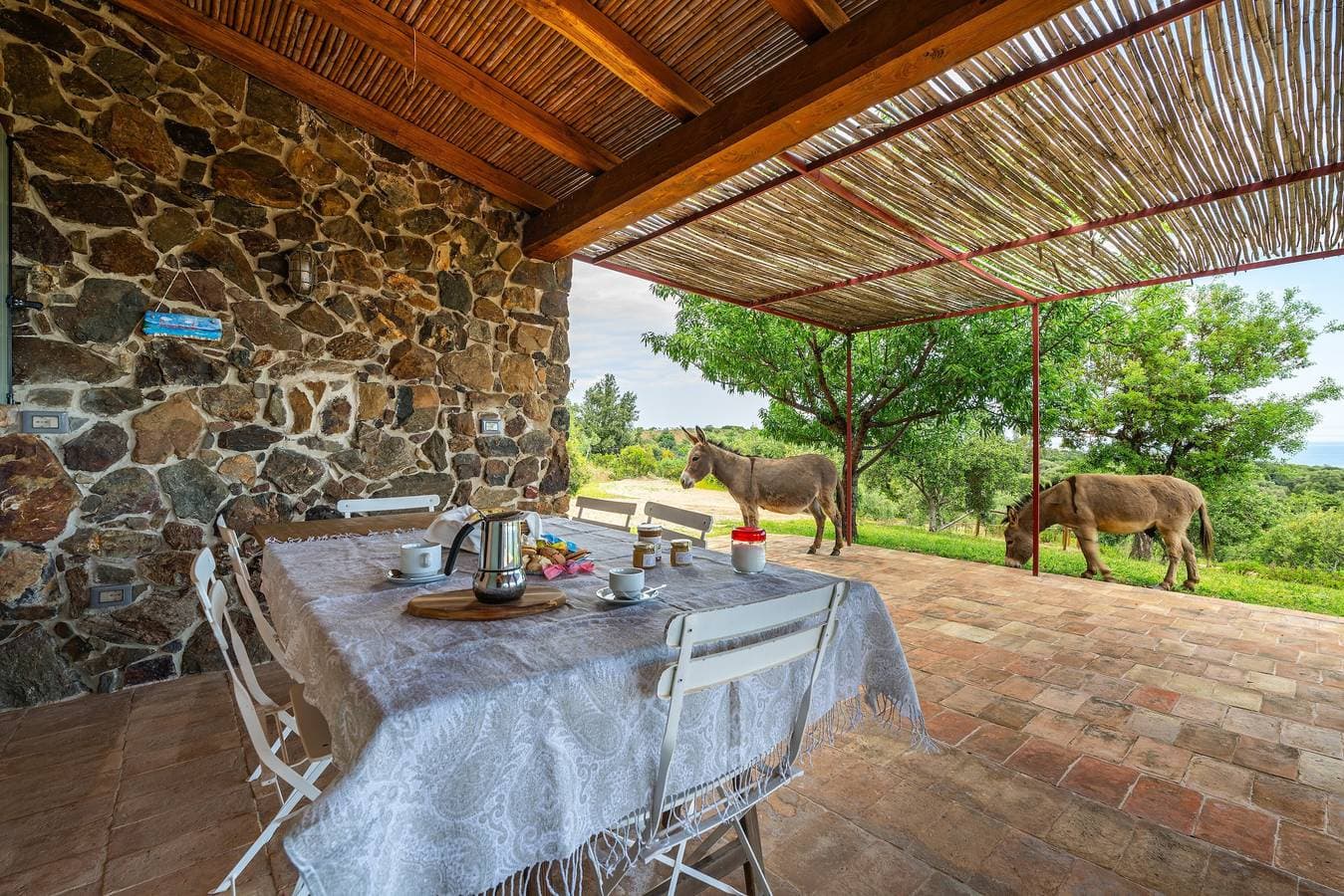 Foto 3 von 23: La Tanca Del Conte – Suite Banano mit privatem Pool und Meerblick