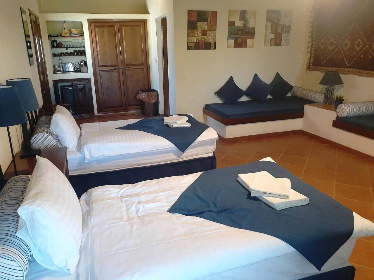 Foto 6 von 12: Triple Room with Terrace