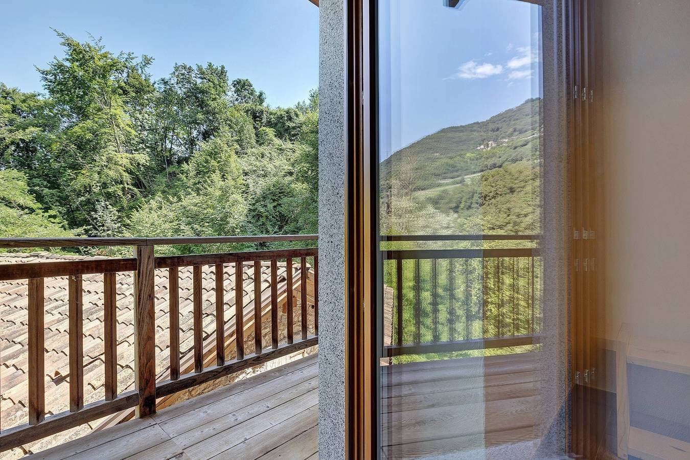 Foto 11 von 27: Ferienwohnung 'Casa Al Mulino 1' mit Bergblick, Gemeinschaftsgarten und WLAN