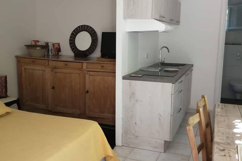 Foto 2 von 6: Nice Studio With Terrace, Parking and Garden in Green and Quiet