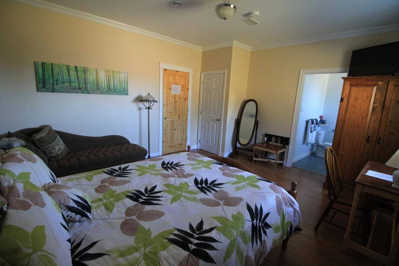 Foto 5 von 11: Triple Room with Garden View