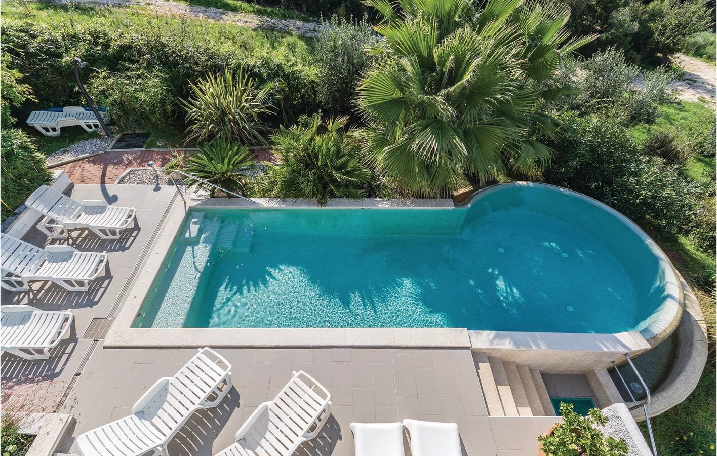 Foto 9 von 25: Gemütlich, nur 1,5 km vom Strand entfernt: Ein Rückzugsort mit saisonalem Pool und moderner Ausstattung