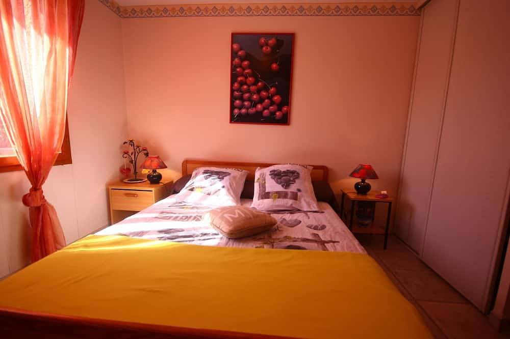 Foto 2 von 8: Schlafzimmer mit Sd im Erdgeschoss einer Villa